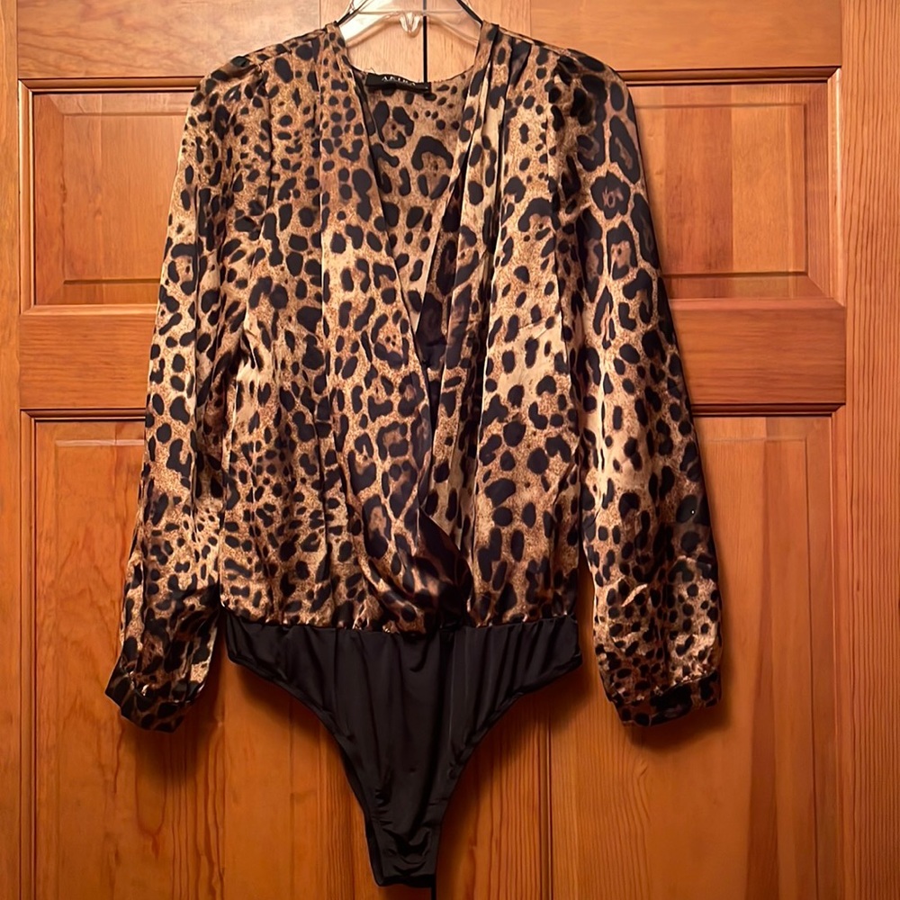Leopard Print Surplice Bodysuit size M.